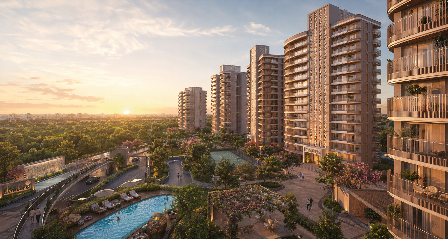 Aerial sunset view of Latitude 27 towers with pool, court and landscaped township